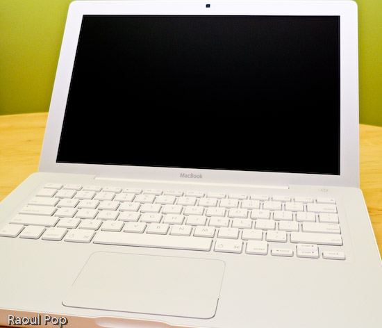 13? White MacBook with lid open