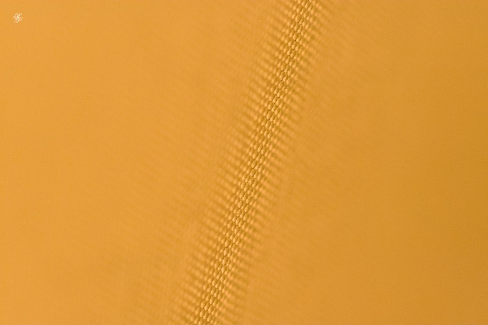 Macro, texture of a tightly woven cloth.