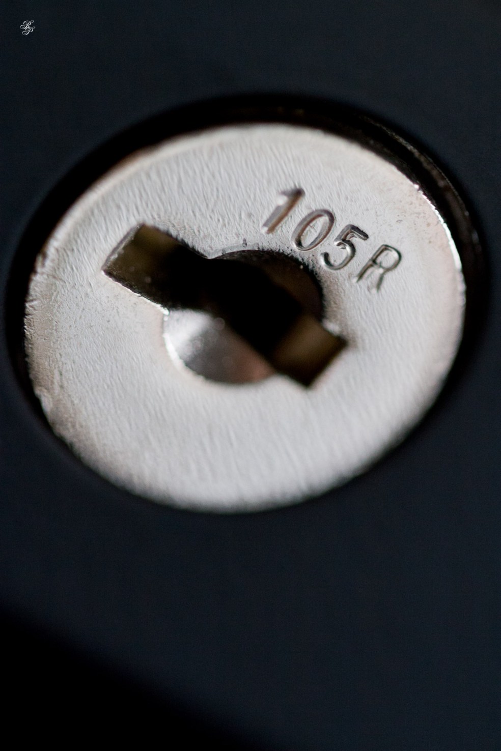 A lock on a file cabinet, model 105R, macro.
